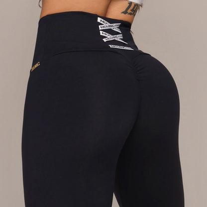 Leggins con tiras blancas